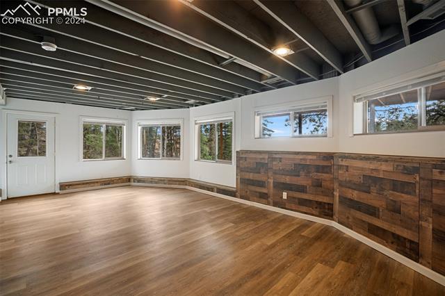 398 Pinewood Road Florissant, CO 80816 - Photo 34 of 43 Family Room featuring wood-style floors