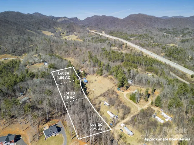 a view of a garden with a building