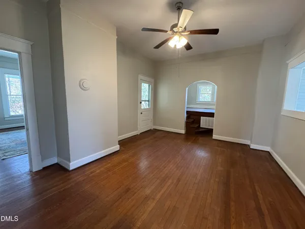 an empty room with windows