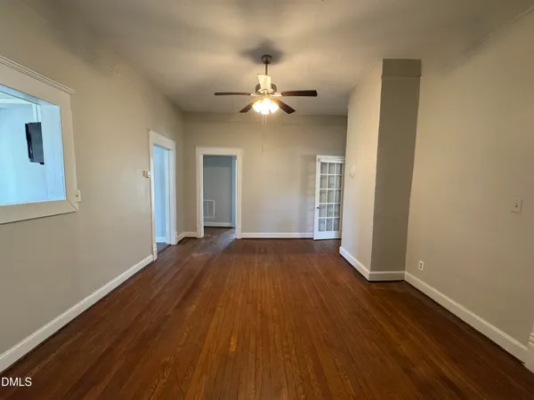 a view of a livingroom with furniture and window