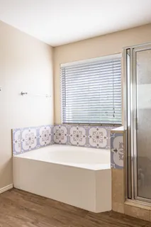 a view of a bathtub in a room