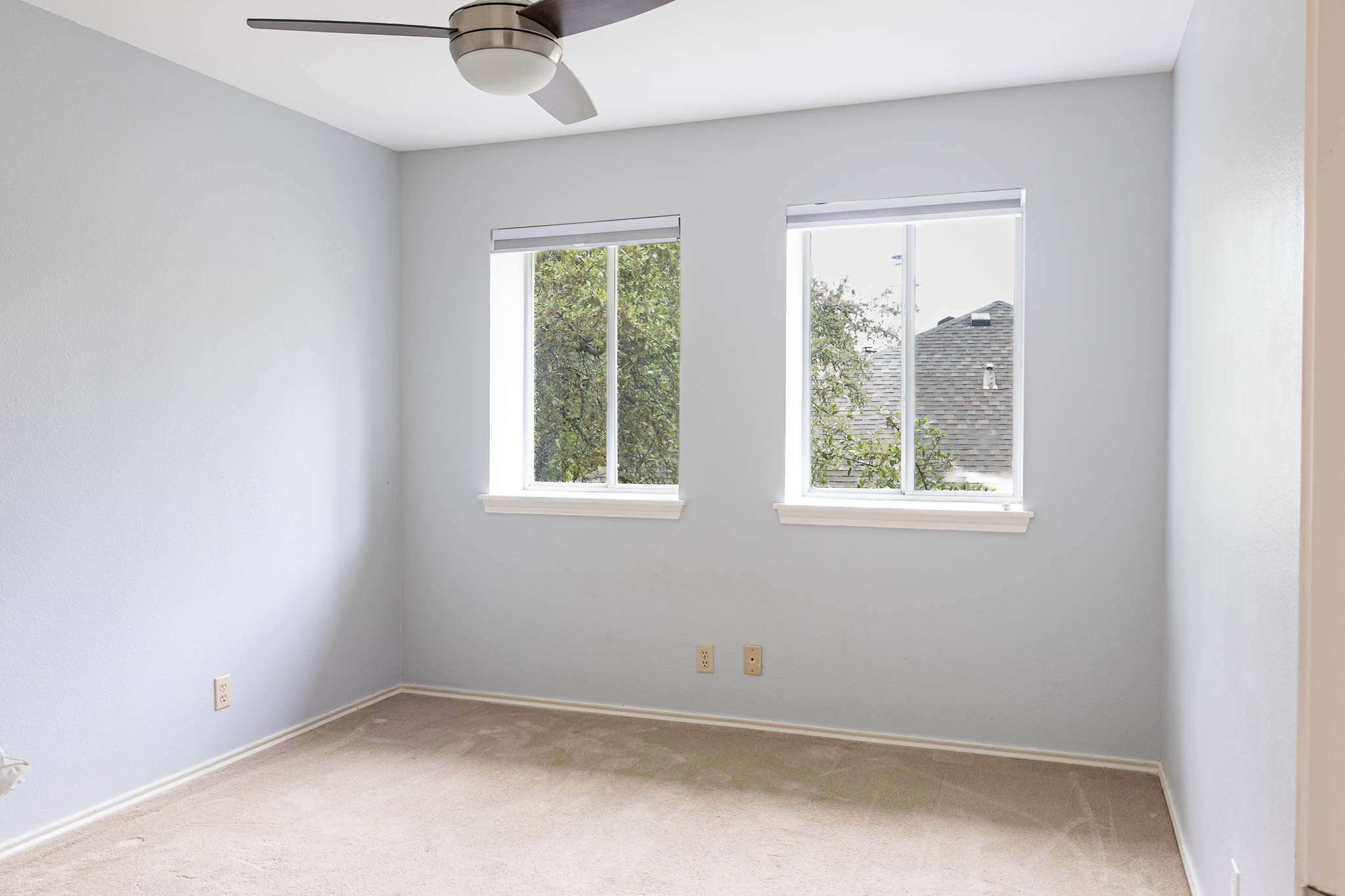 3704 Caney Creek Road Austin, TX 78732 - Photo 25 of 38 an empty room with a window