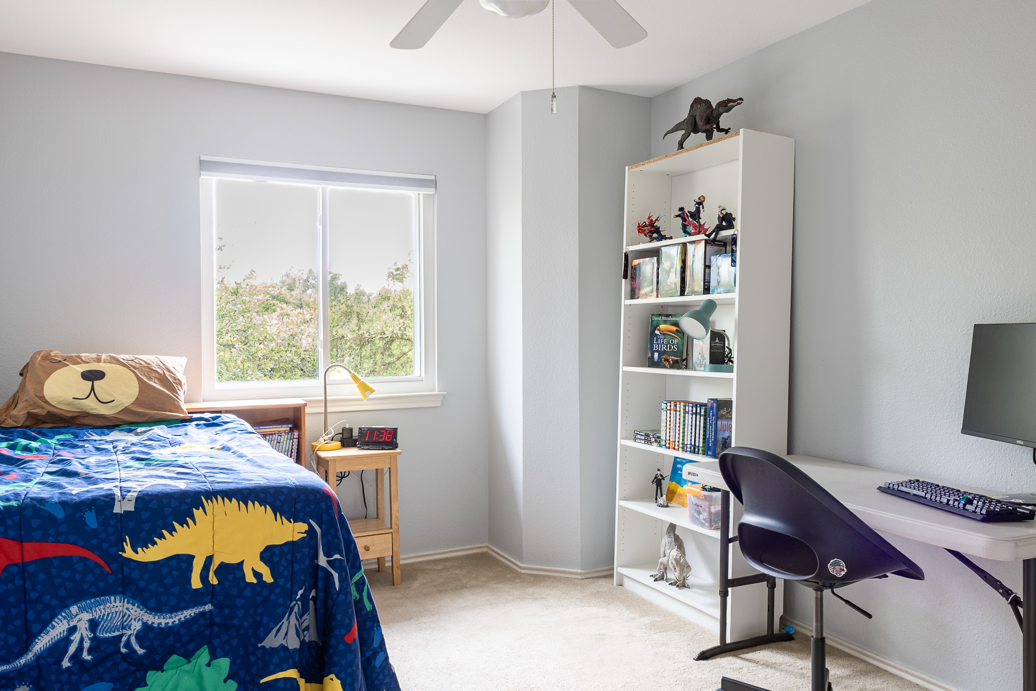 3704 Caney Creek Road Austin, TX 78732 - Photo 26 of 38 a bedroom with a bed and a window
