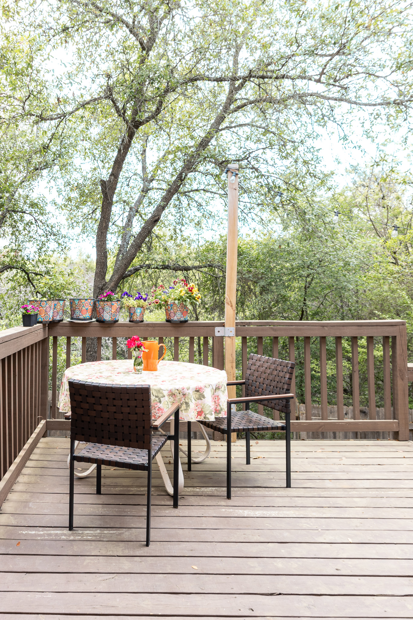 3704 Caney Creek Road Austin, TX 78732 - Photo 29 of 38 a view of a terrace with wooden floor and outdoor seating