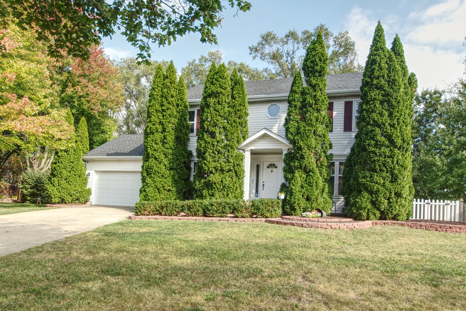 2312 Verdun Drive Joliet, IL 60435 - Photo 1 of 24 a front view of a house with garden