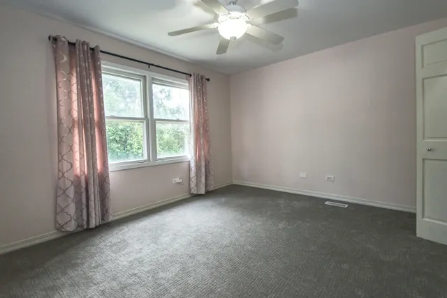 a view of an empty room with window