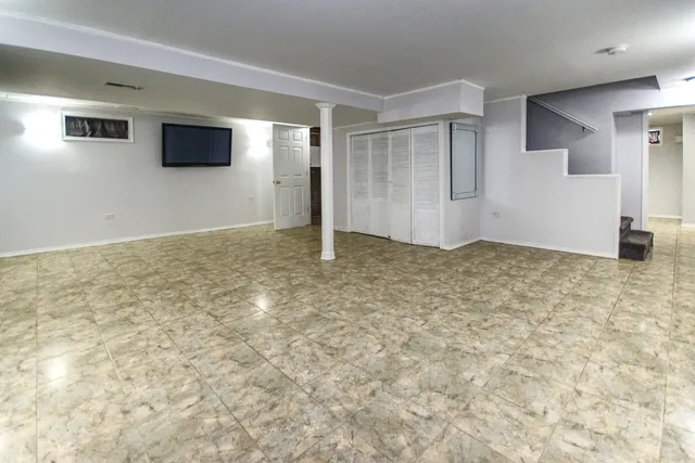 a view of room with walk in closet and empty room