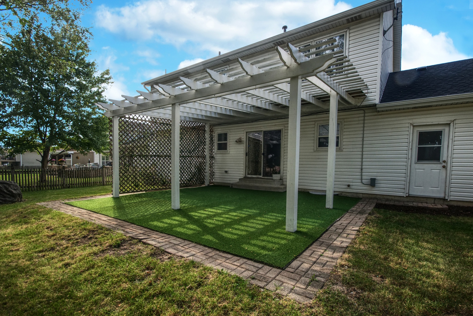 2312 Verdun Drive Joliet, IL 60435 - Photo 22 of 24 a view of a house with backyard