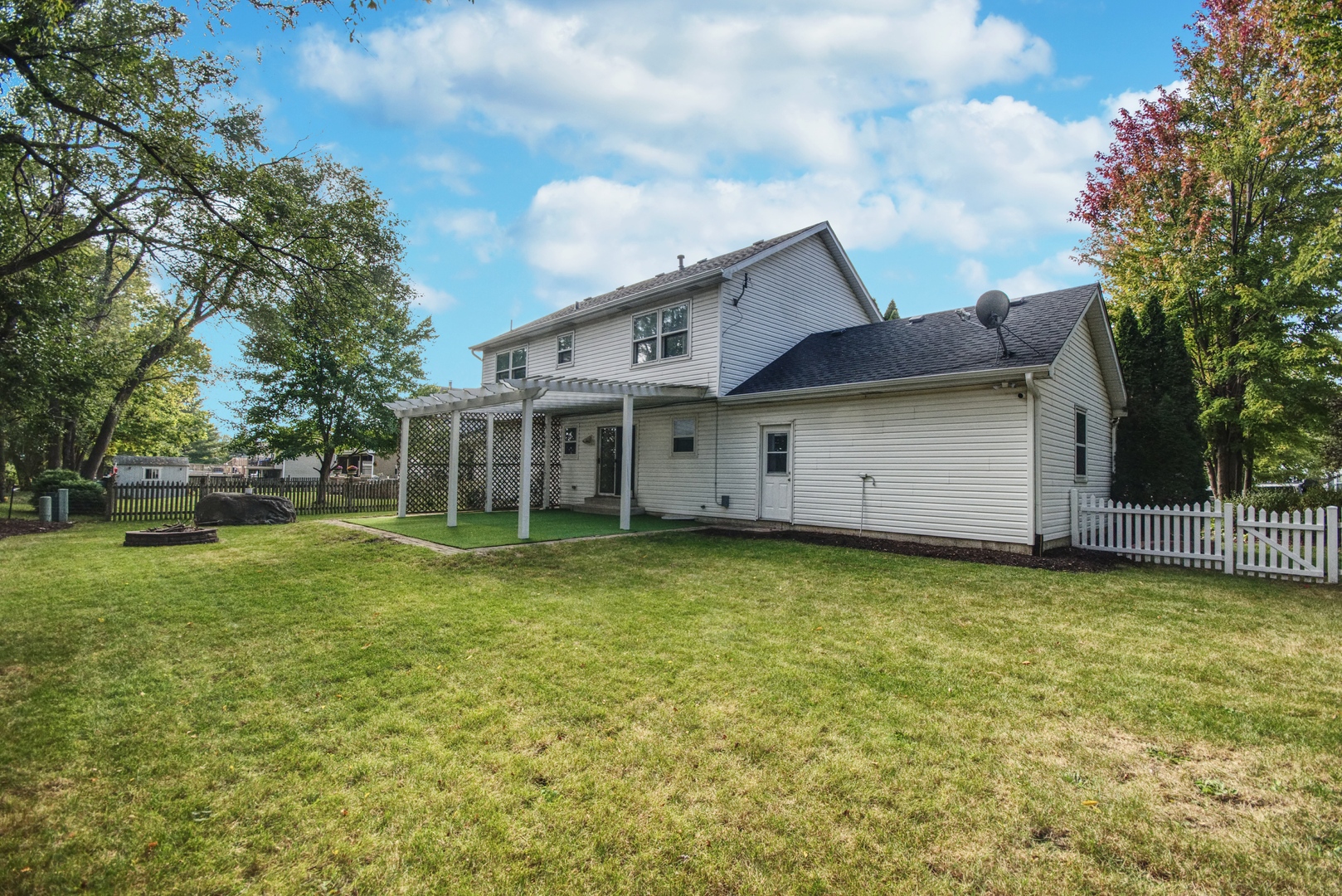 2312 Verdun Drive Joliet, IL 60435 - Photo 24 of 24 a house view with a garden space