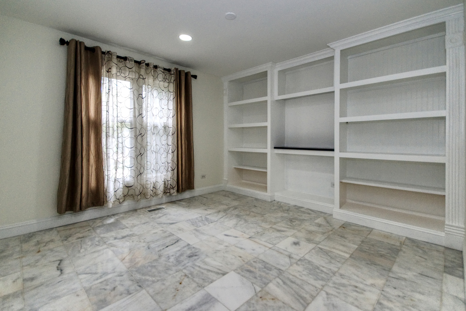 2312 Verdun Drive Joliet, IL 60435 - Photo 9 of 24 a view of an empty room with a window