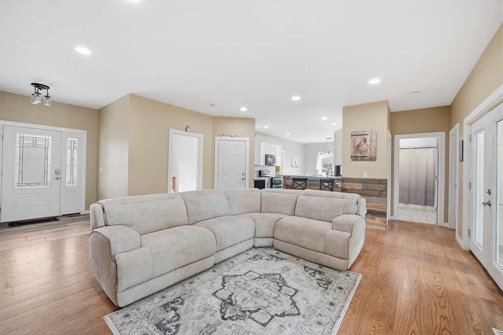 96 Stafford Hollow Road Monson, MA 01057 - Photo 12 of 39 a living room with furniture and a rug