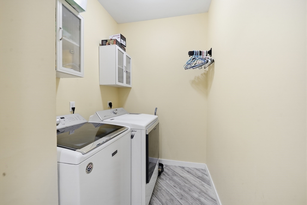 96 Stafford Hollow Road Monson, MA 01057 - Photo 16 of 39 a utility room with dryer and washer