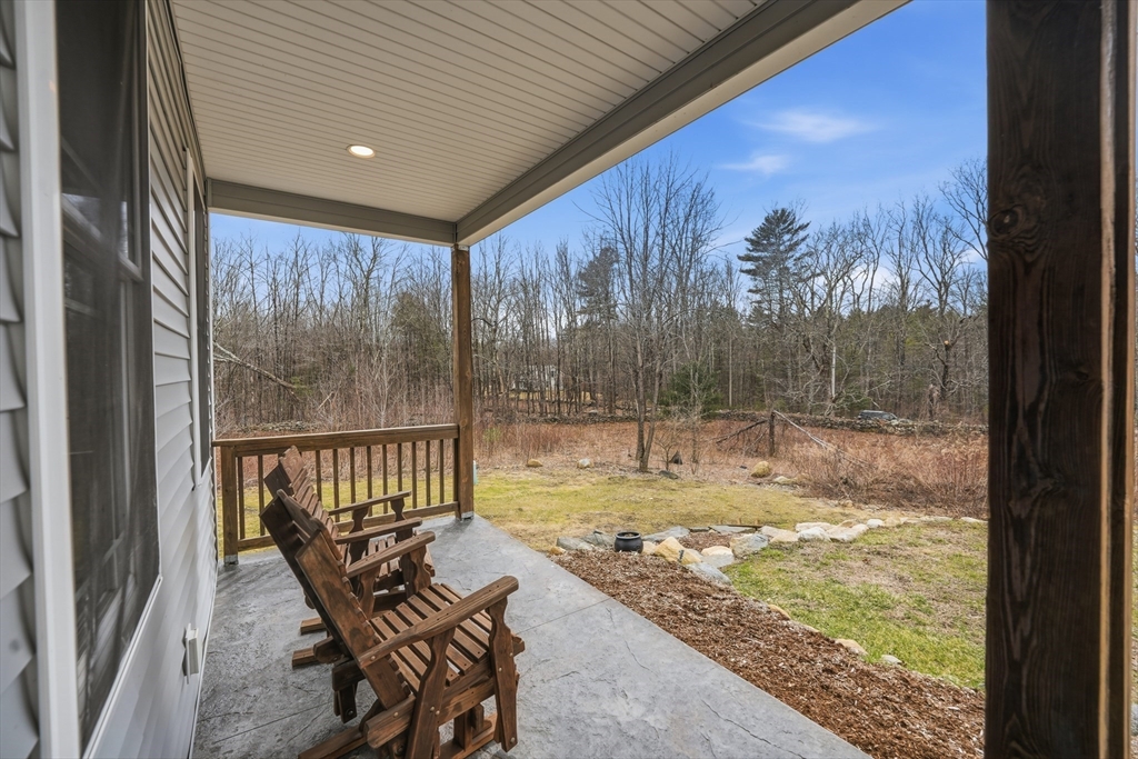 96 Stafford Hollow Road Monson, MA 01057 - Photo 2 of 39 a view of a swimming pool with a patio