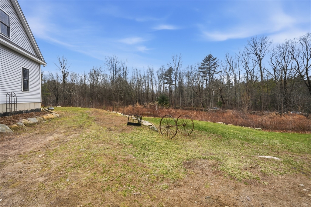 96 Stafford Hollow Road Monson, MA 01057 - Photo 3 of 39 a view of a backyard with a trampoline