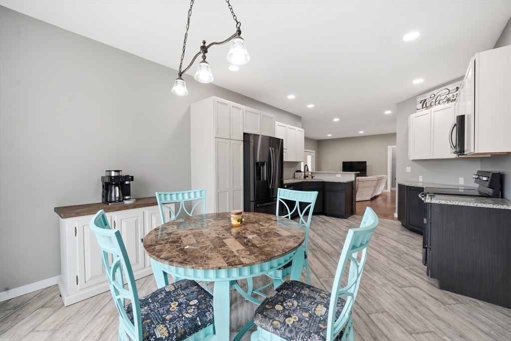 96 Stafford Hollow Road Monson, MA 01057 - Photo 8 of 39 a view of a dining room with furniture