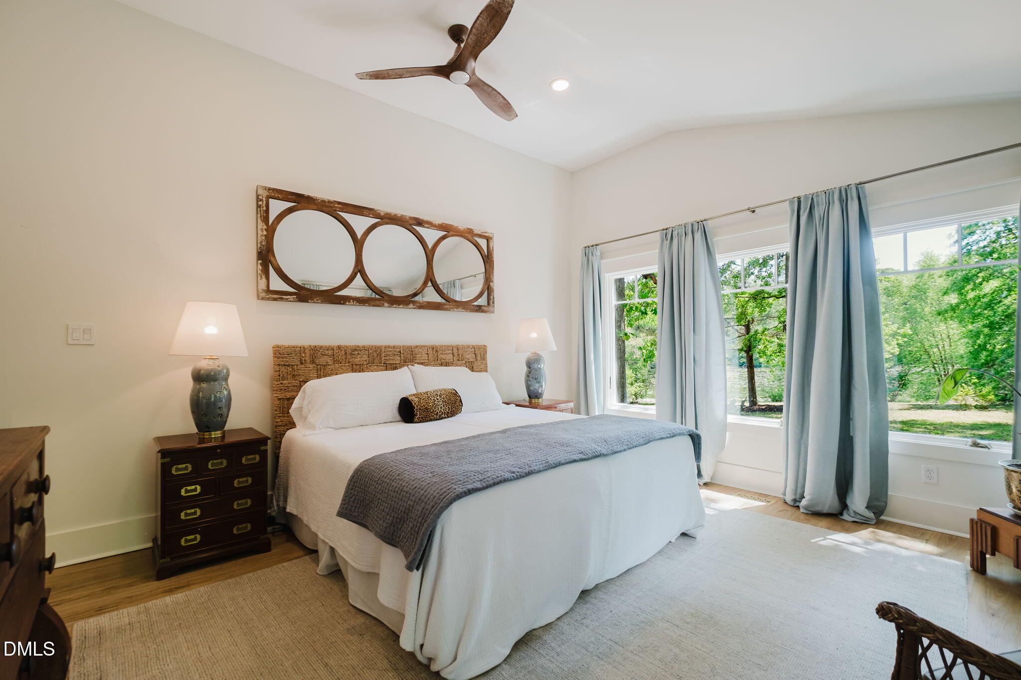 370 Robinson Ferry Road Macon, NC 27551 - Photo 37 of 85 a bedroom with a bed and a window