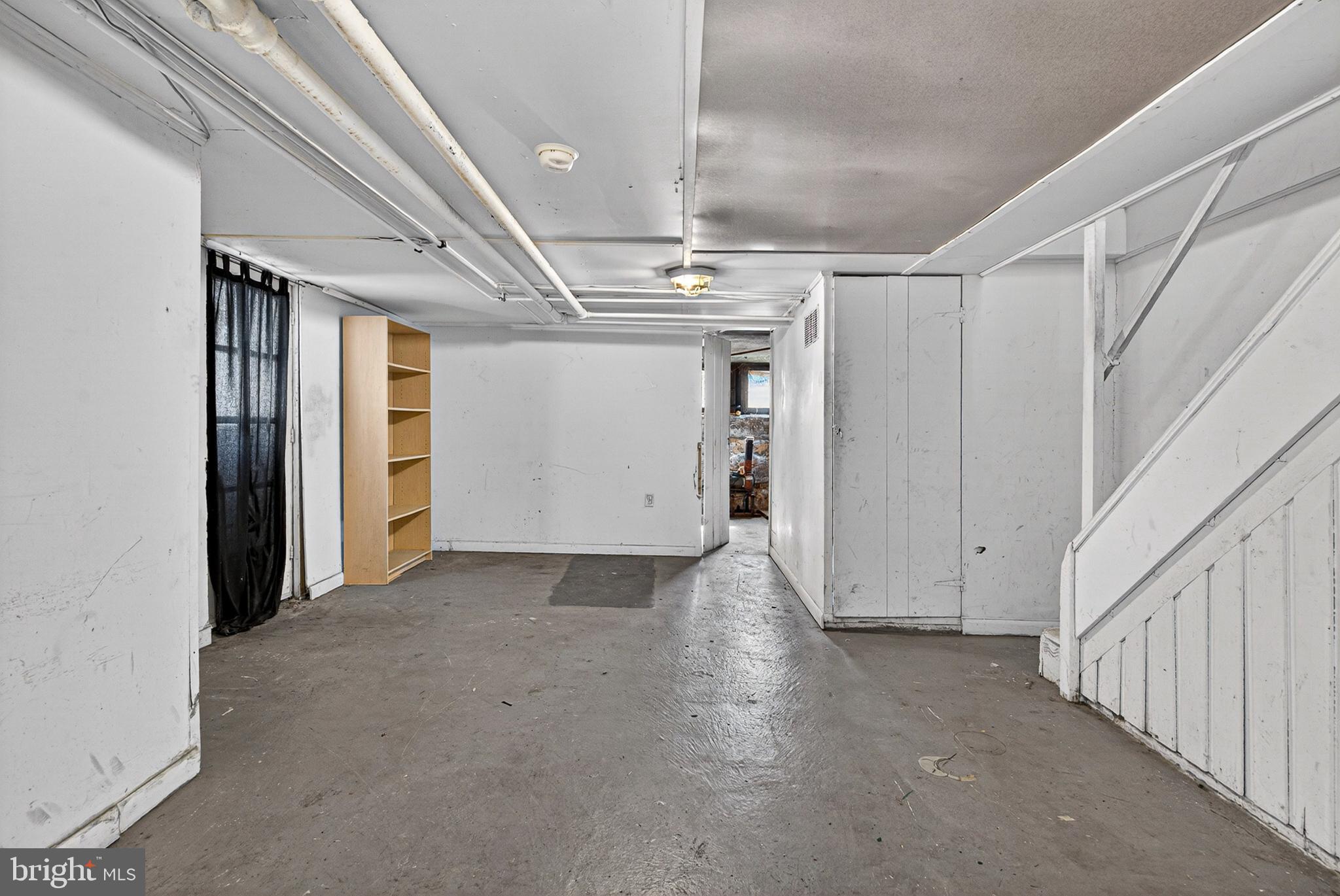 3628 Elkader Road Baltimore, MD 21218 - Photo 19 of 30 Partially finished basement w/lots of storage