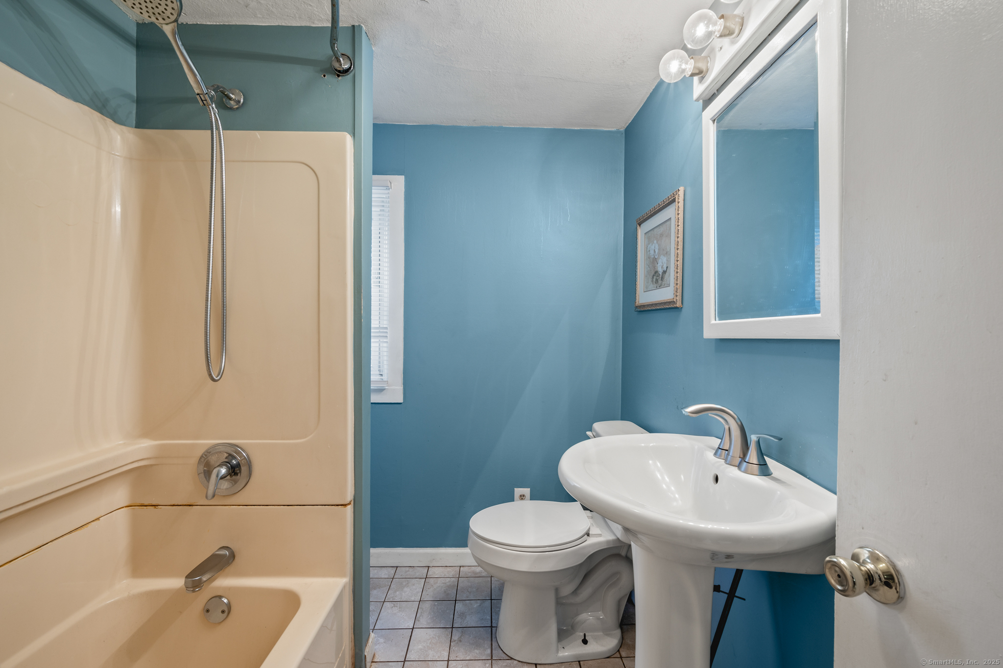 322 Crystal Lake Road Tolland, CT 06084 - Photo 22 of 29 a bathroom with a sink toilet and shower