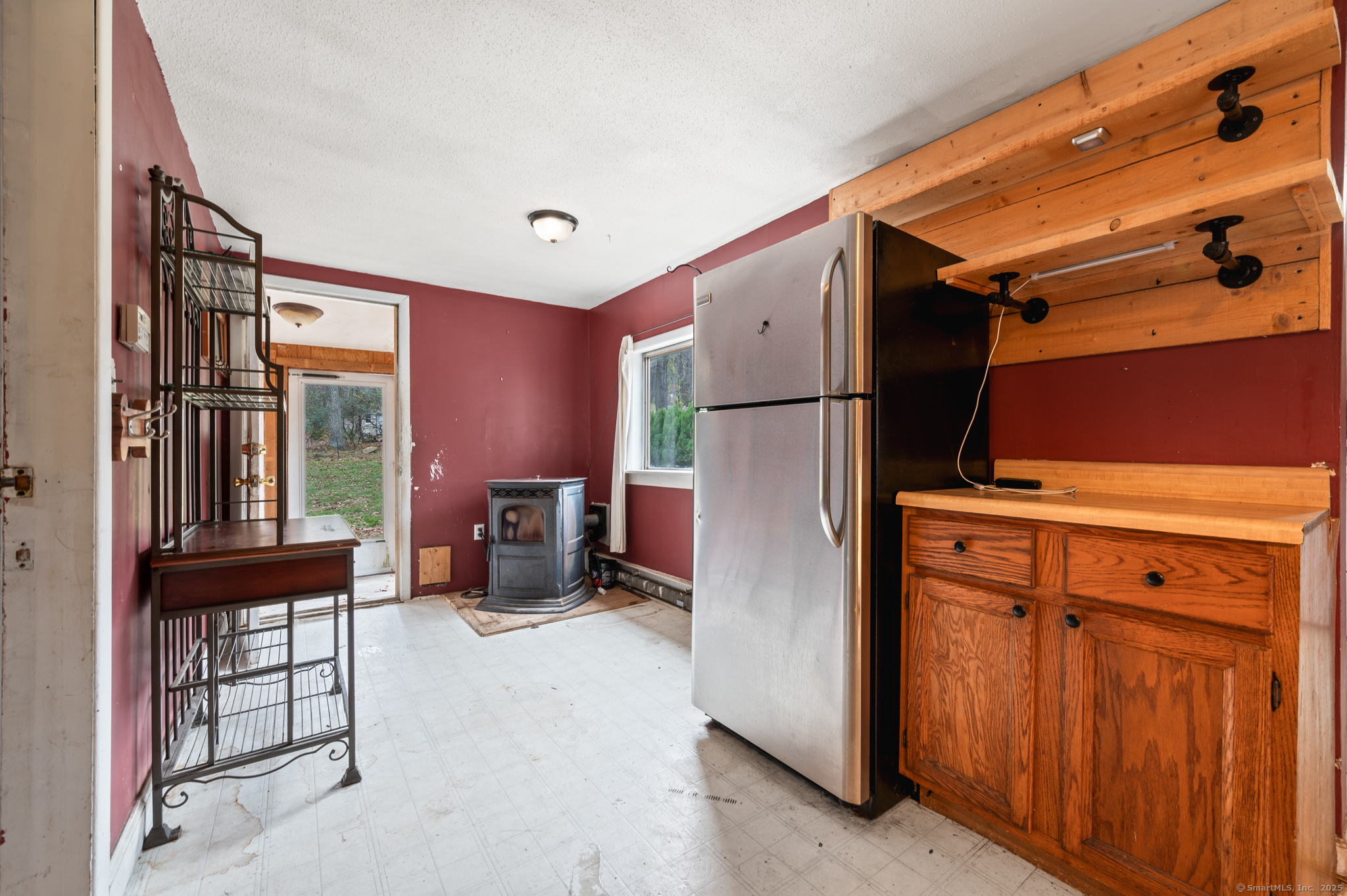 322 Crystal Lake Road Tolland, CT 06084 - Photo 24 of 29 a view of kitchen with furniture and a window