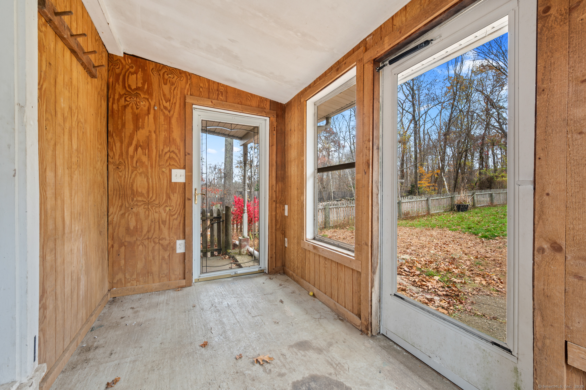 322 Crystal Lake Road Tolland, CT 06084 - Photo 29 of 29 a view of a porch with wooden floor and outdoor shower