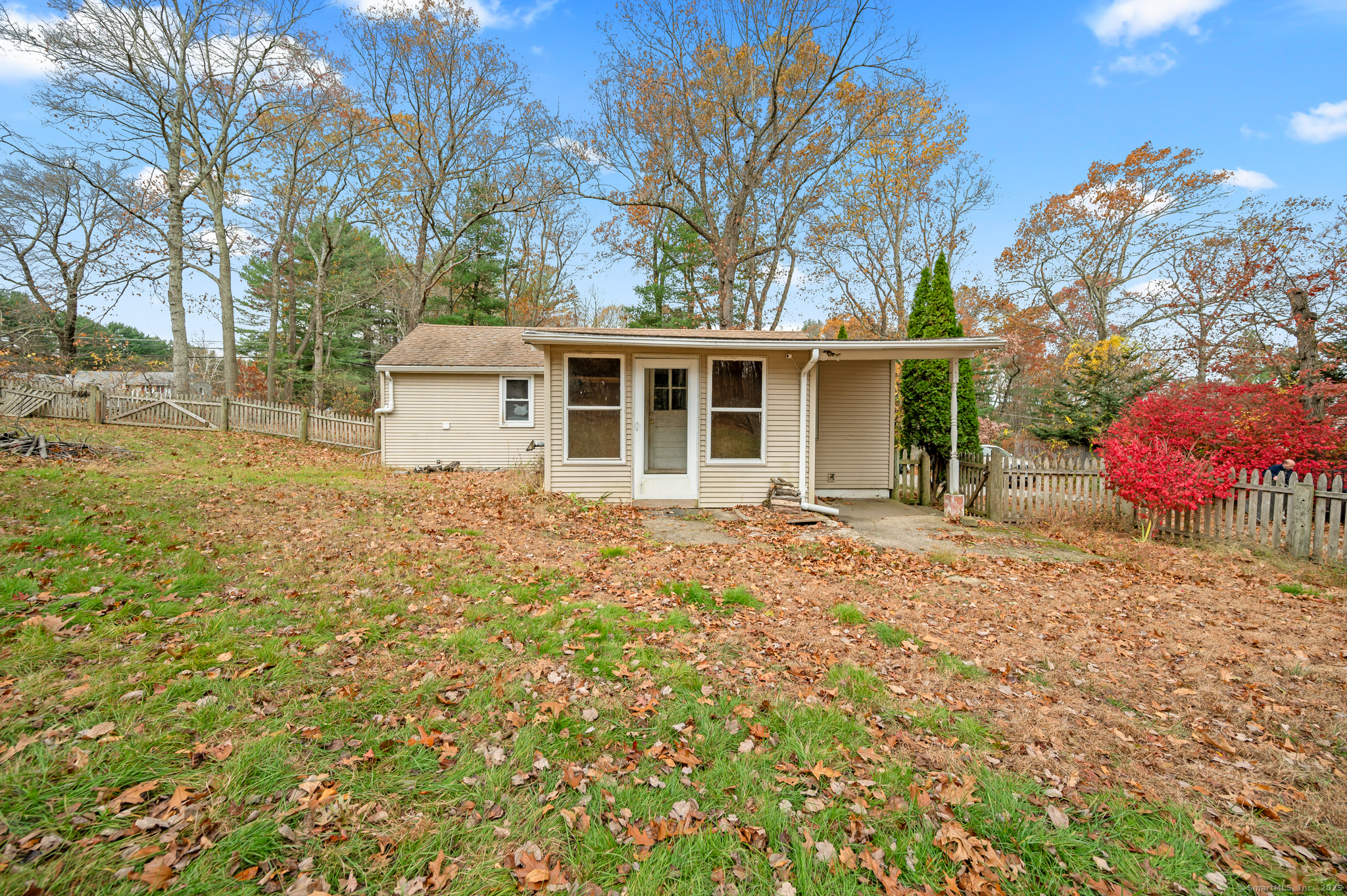 322 Crystal Lake Road Tolland, CT 06084 - Photo 4 of 29 a house with yard in front of it