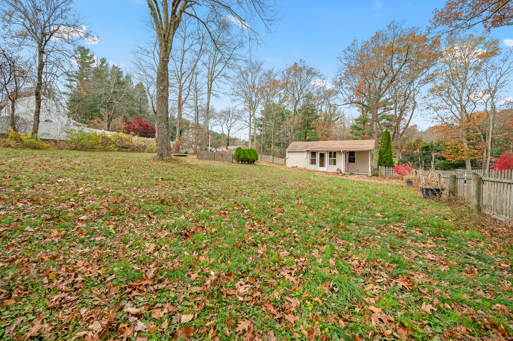 322 Crystal Lake Road Tolland, CT 06084 - Photo 6 of 29 a view of a house with a yard