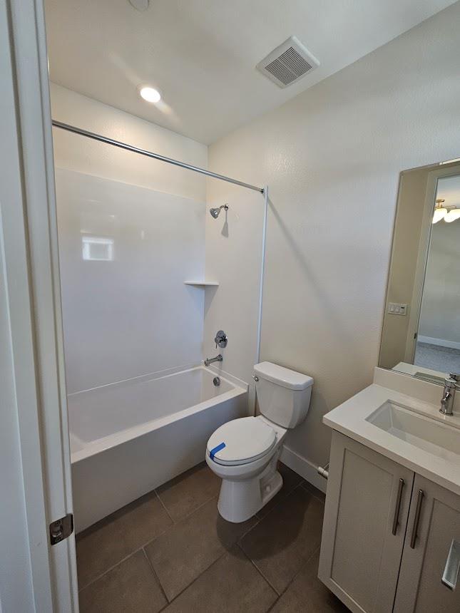 122 Ranch Lane Mountain View, CA 94040 - Photo 19 of 20 a bathroom with a granite countertop toilet a sink and a bathtub