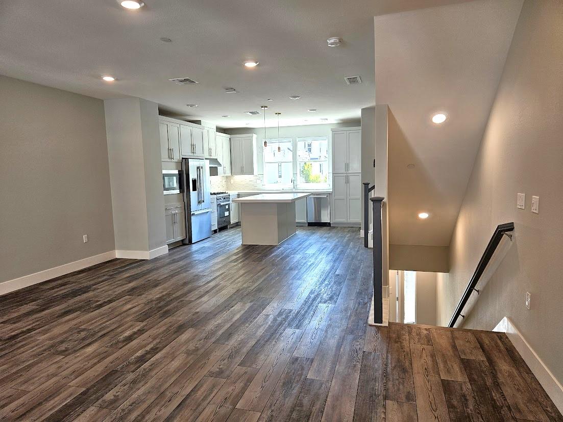 122 Ranch Lane Mountain View, CA 94040 - Photo 7 of 20 a view of a living room and wooden floor