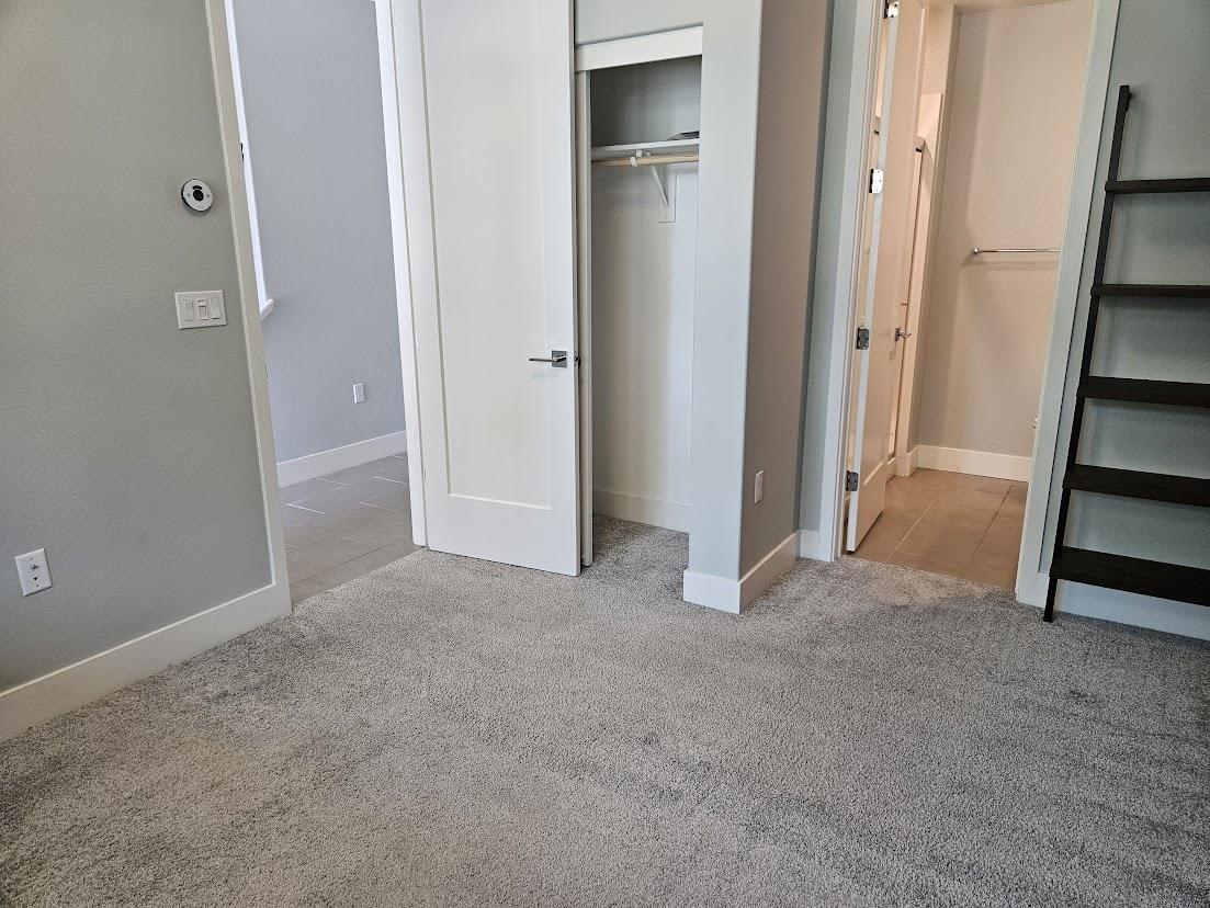 122 Ranch Lane Mountain View, CA 94040 - Photo 9 of 20 an empty room with windows