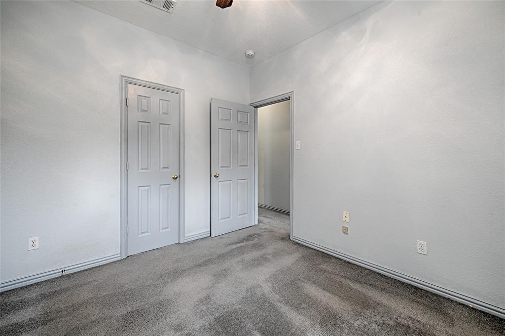 400 Dale Hollow Road Fort Worth, TX 76103 - Photo 17 of 29 an empty room with closet area