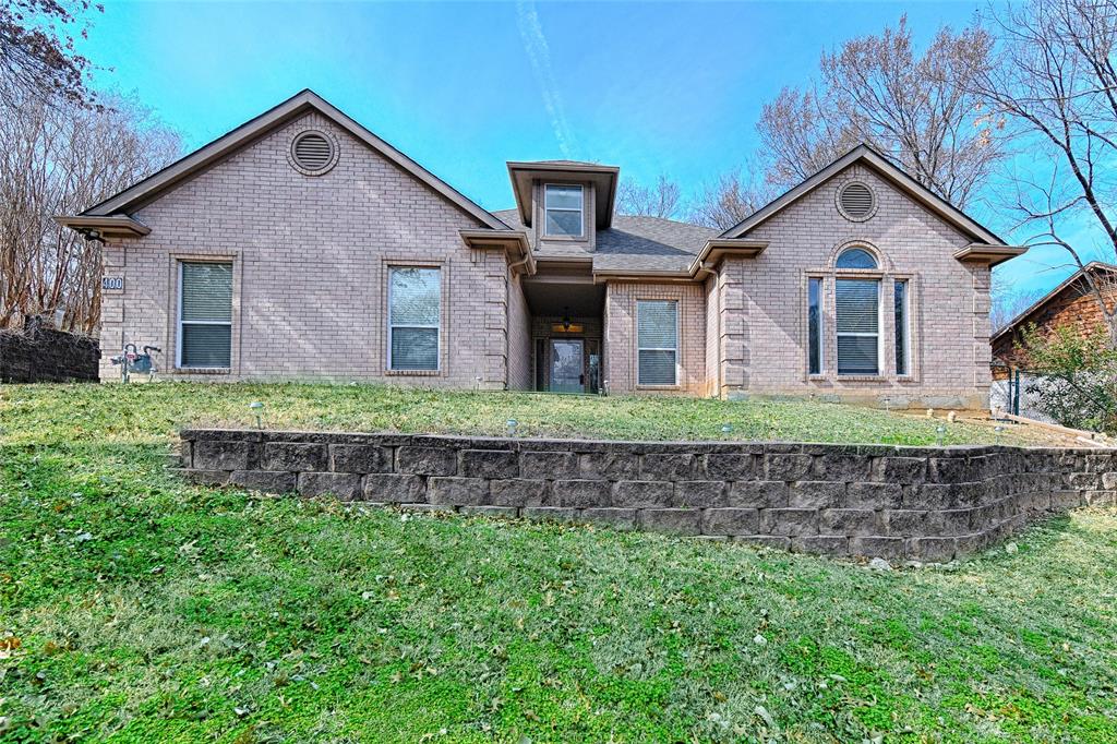 400 Dale Hollow Road Fort Worth, TX 76103 - Photo 2 of 29 a front view of a house with a yard