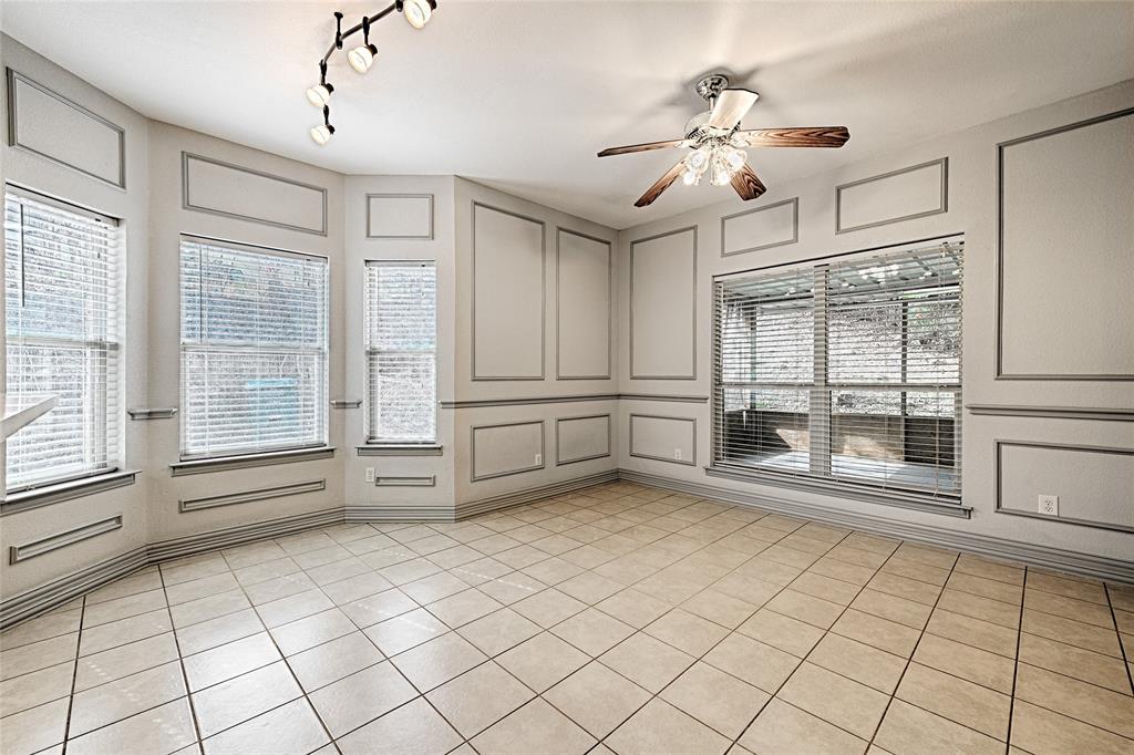 400 Dale Hollow Road Fort Worth, TX 76103 - Photo 8 of 29 a view of an empty room with a window