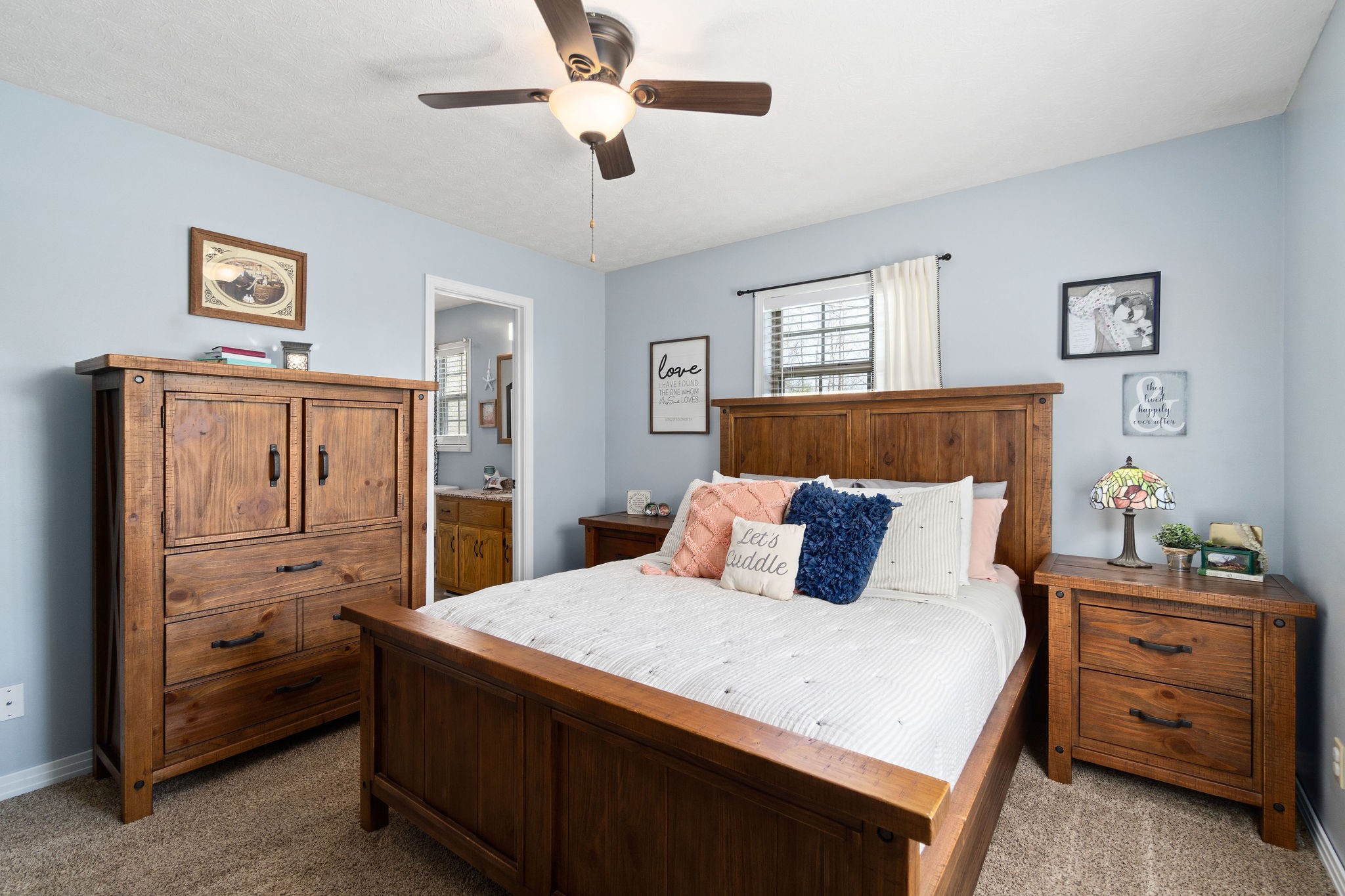 2868 Waverly Road Tennessee Ridge, TN 37178 - Photo 17 of 33 a bedroom with a large bed and a window
