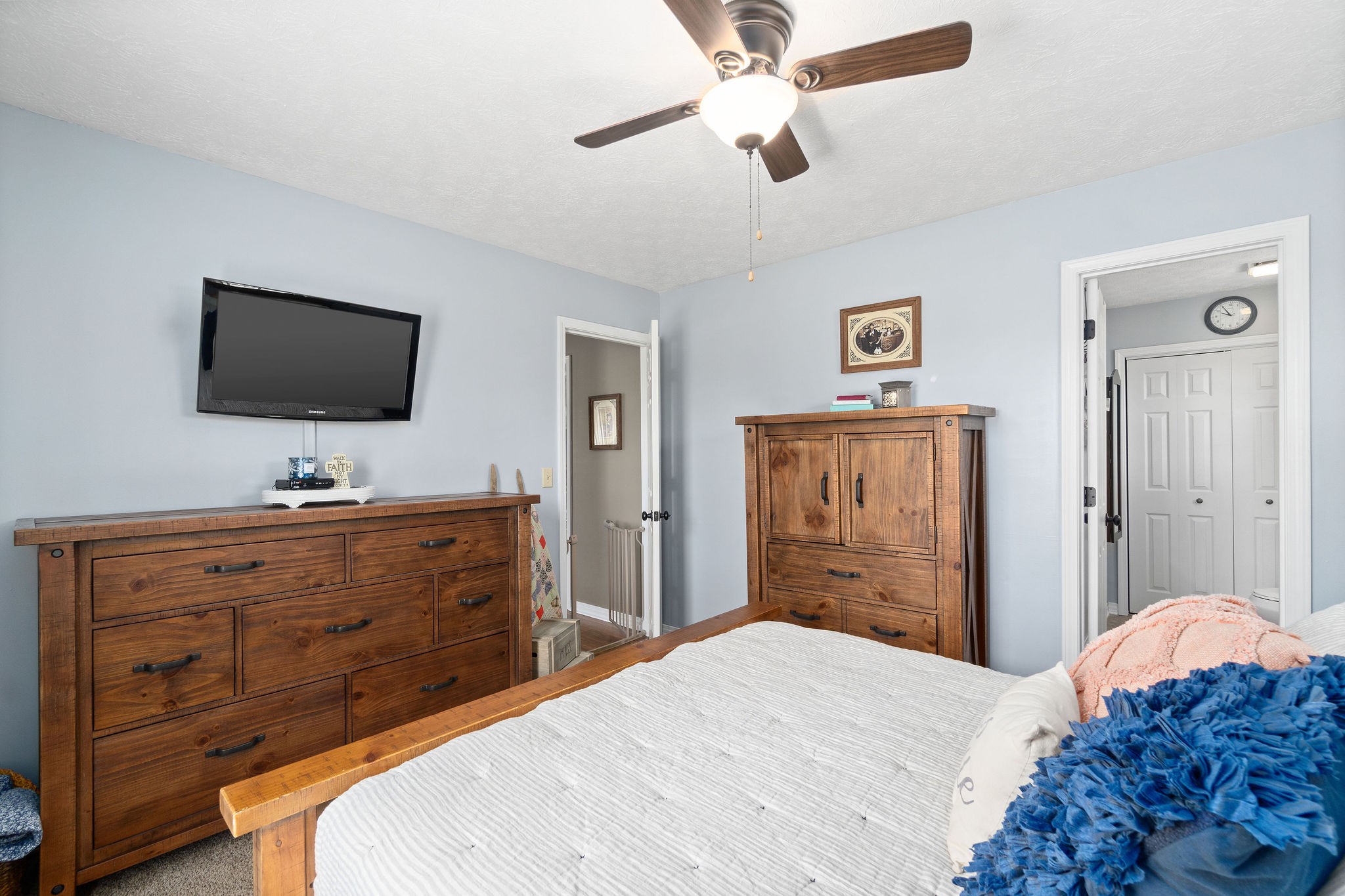 2868 Waverly Road Tennessee Ridge, TN 37178 - Photo 19 of 33 a bedroom with a bed and a flat screen tv