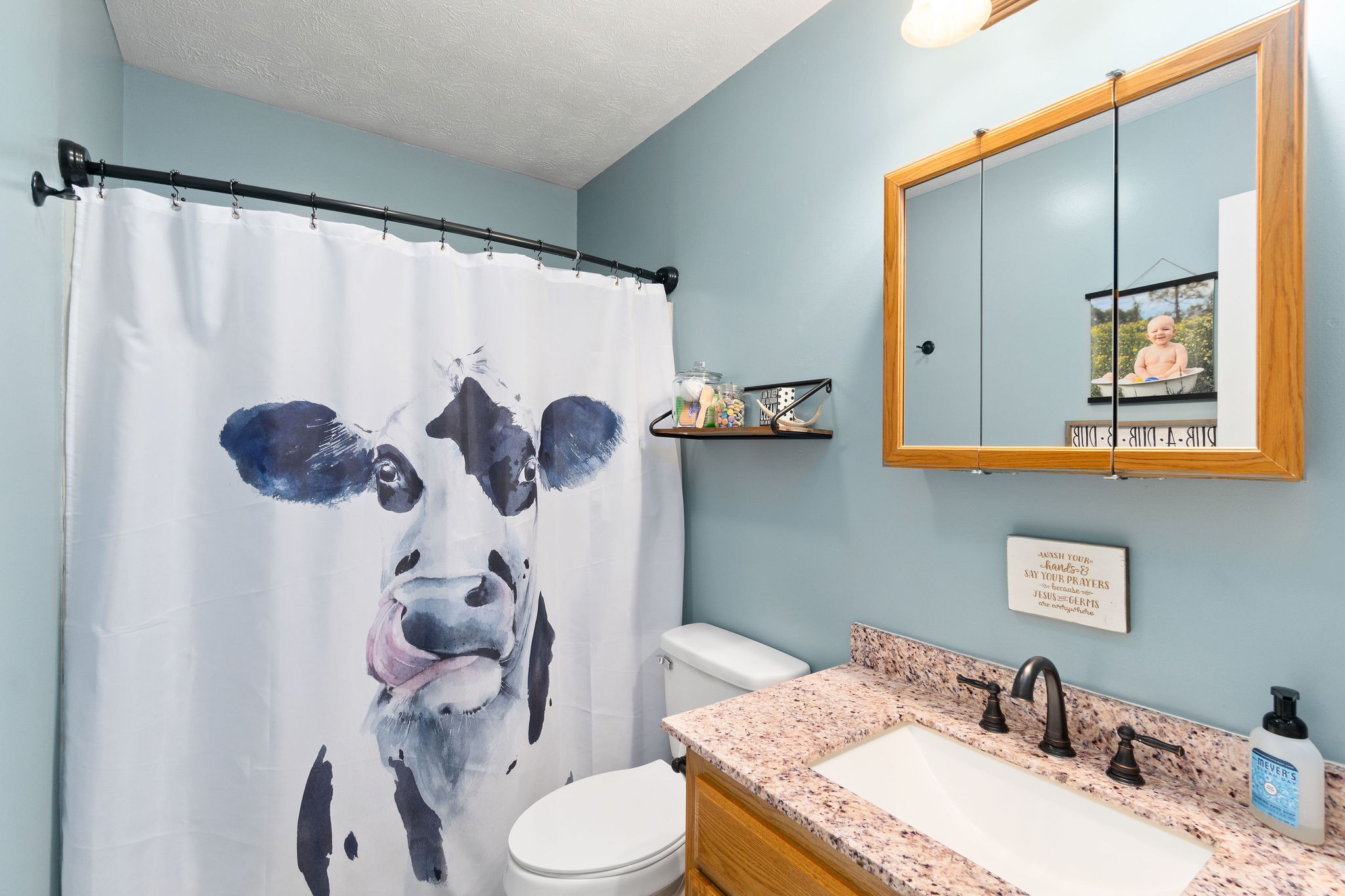 2868 Waverly Road Tennessee Ridge, TN 37178 - Photo 24 of 33 a bathroom with a granite countertop sink mirror and toilet