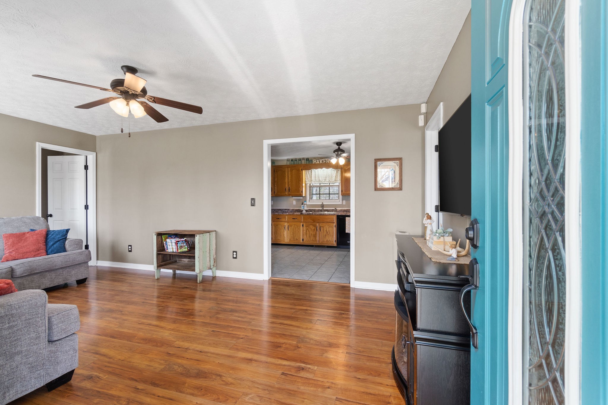 2868 Waverly Road Tennessee Ridge, TN 37178 - Photo 4 of 33 a living room with furniture and wooden floor