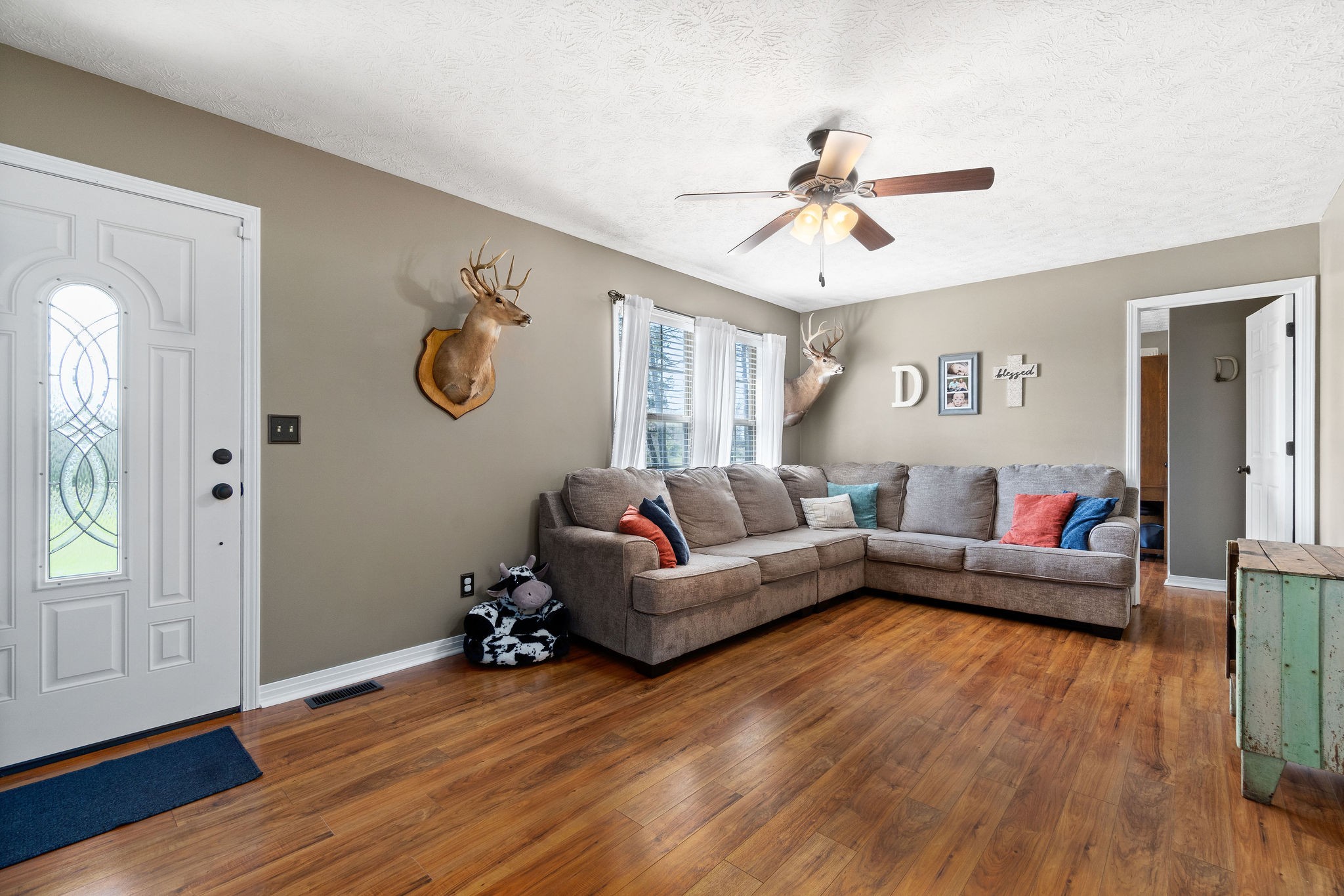 2868 Waverly Road Tennessee Ridge, TN 37178 - Photo 5 of 33 a living room with furniture and wooden floor