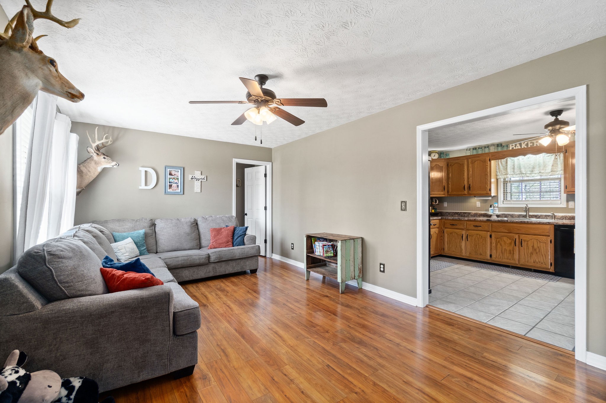 2868 Waverly Road Tennessee Ridge, TN 37178 - Photo 8 of 33 a living room with furniture and kitchen view