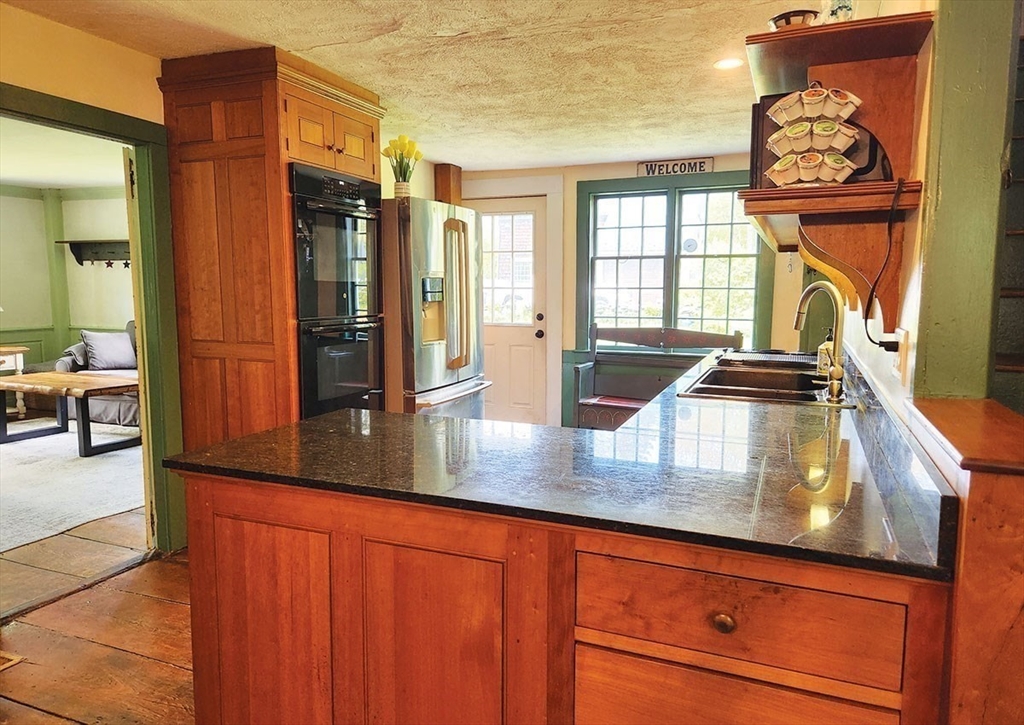 164 Worcester Road Westminster, MA 01473 - Photo 13 of 39 a view of a living room and kitchen