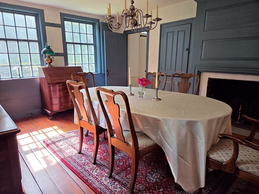 164 Worcester Road Westminster, MA 01473 - Photo 15 of 39 a dining room with furniture a chandelier and wooden floor