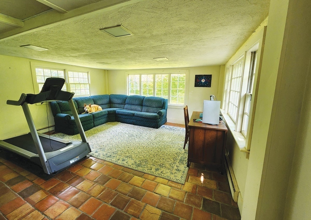 164 Worcester Road Westminster, MA 01473 - Photo 18 of 39 a living room with furniture and a rug