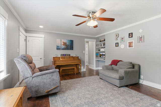 170 North 200 West Springville, UT 84663 - Photo 2 of 13 Living area featuring wood-finish flooring, light gray wall paint, and white trim