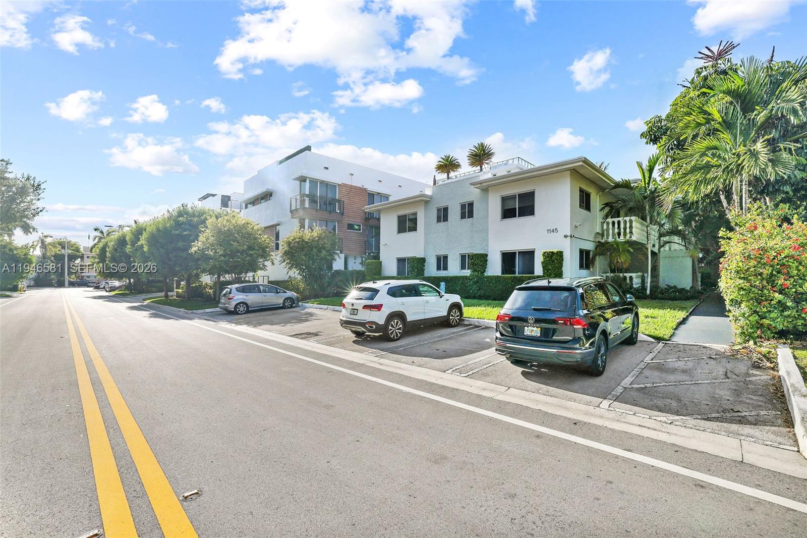 1145 101st Street, Unit 4 Bay Harbor Islands, FL 33154 - Photo 18 of 22 a car parked on the side of the road