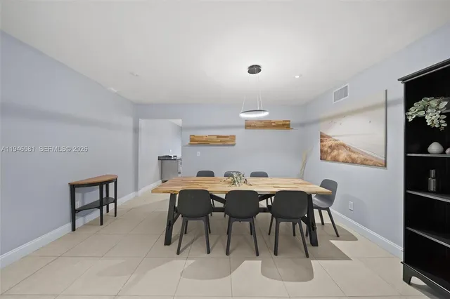 a view of a dining room with furniture