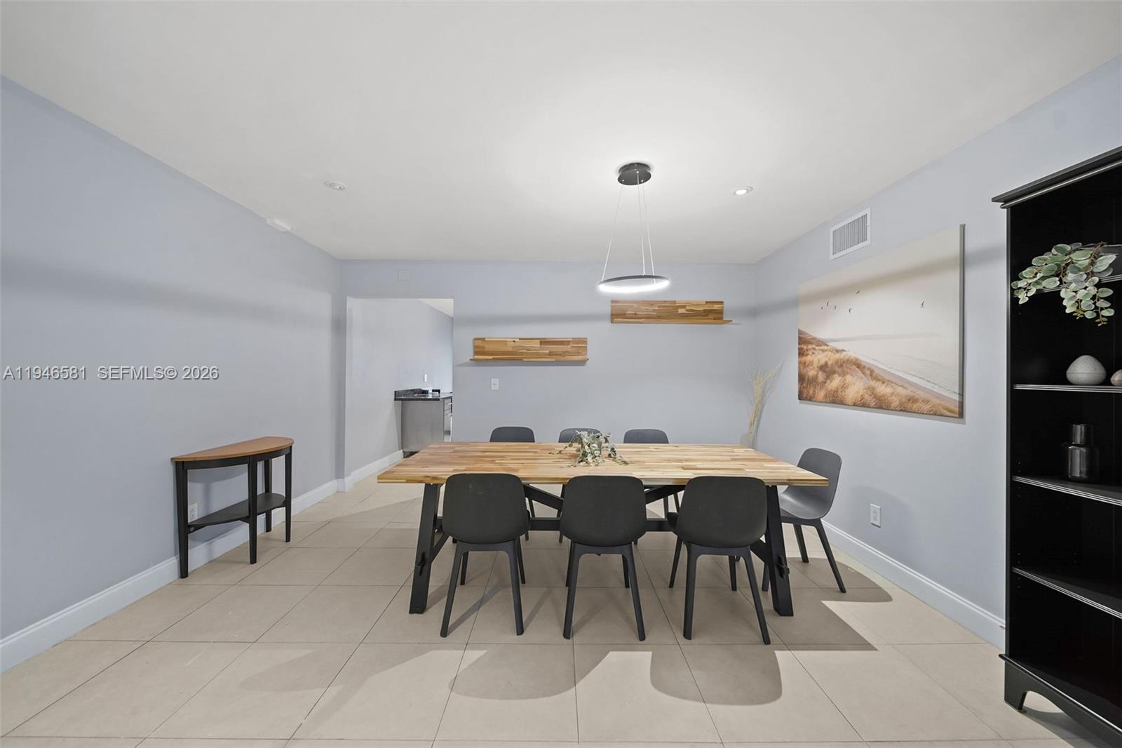 1145 101st Street, Unit 4 Bay Harbor Islands, FL 33154 - Photo 6 of 22 a view of a dining room with furniture