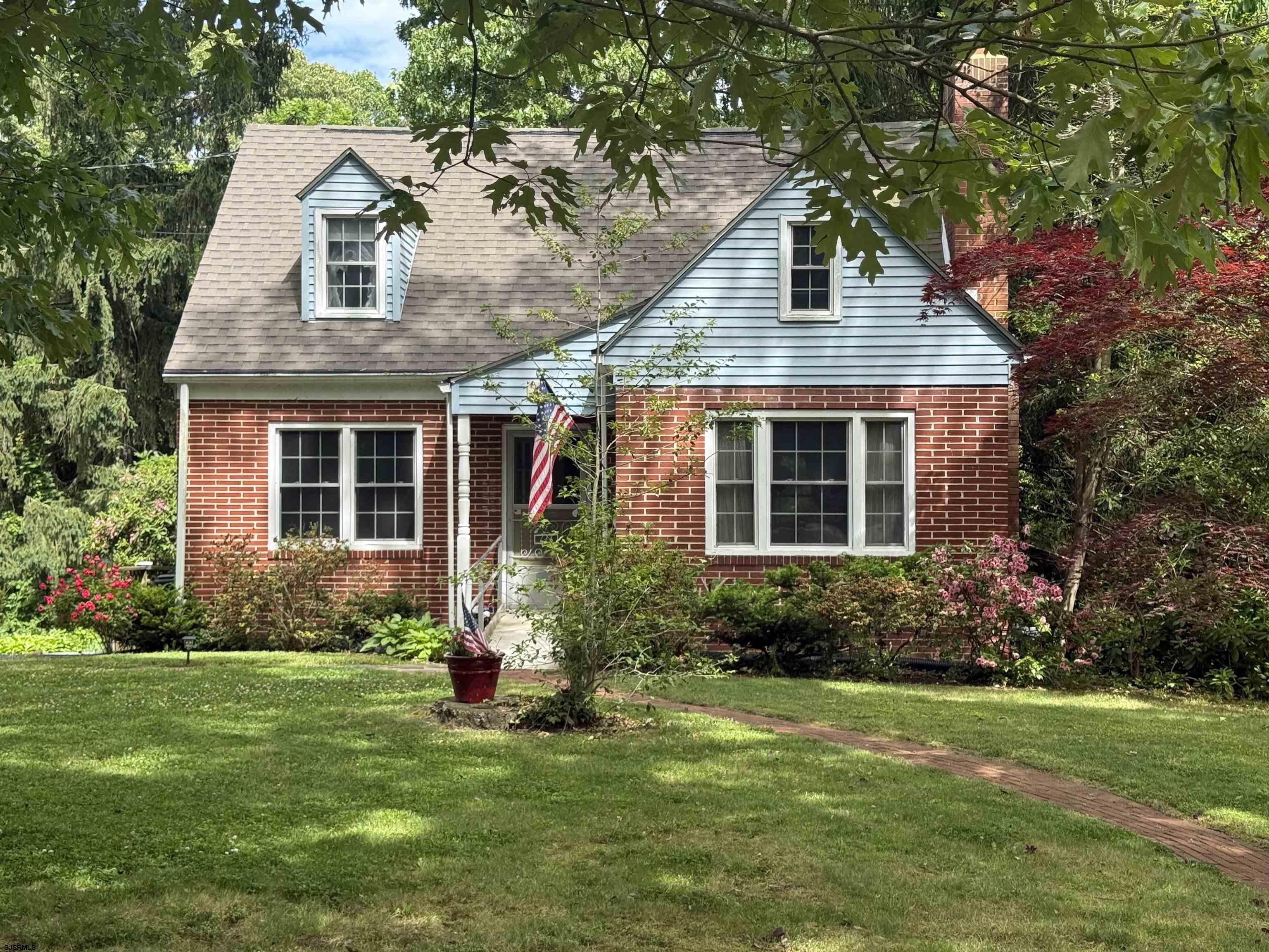 144 Pitney Road Absecon, NJ 08201 - Photo 1 of 47 a front view of house with yard and green space