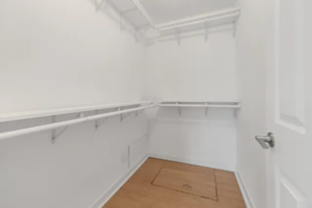 a view of an empty walk in closet