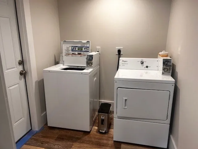a utility room with dryer and washer