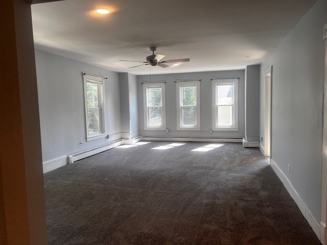 1 Madison Street, Unit B Amesbury, MA 01913 - Photo 8 of 17 a view of livingroom with window