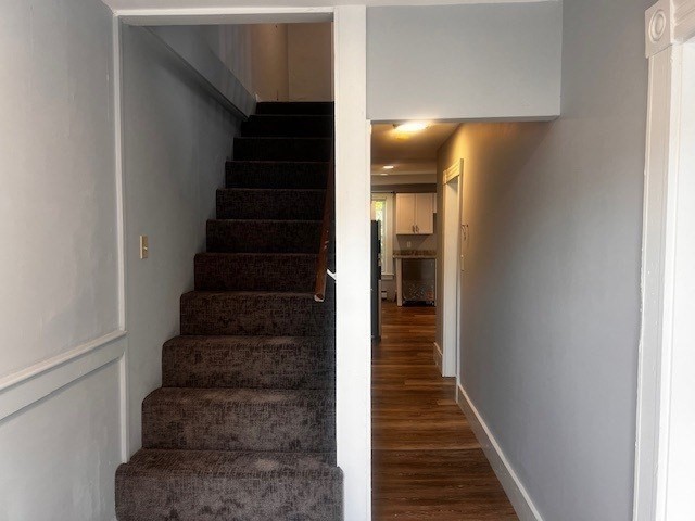 1 Madison Street, Unit B Amesbury, MA 01913 - Photo 9 of 17 a view of entryway and hall with wooden floor